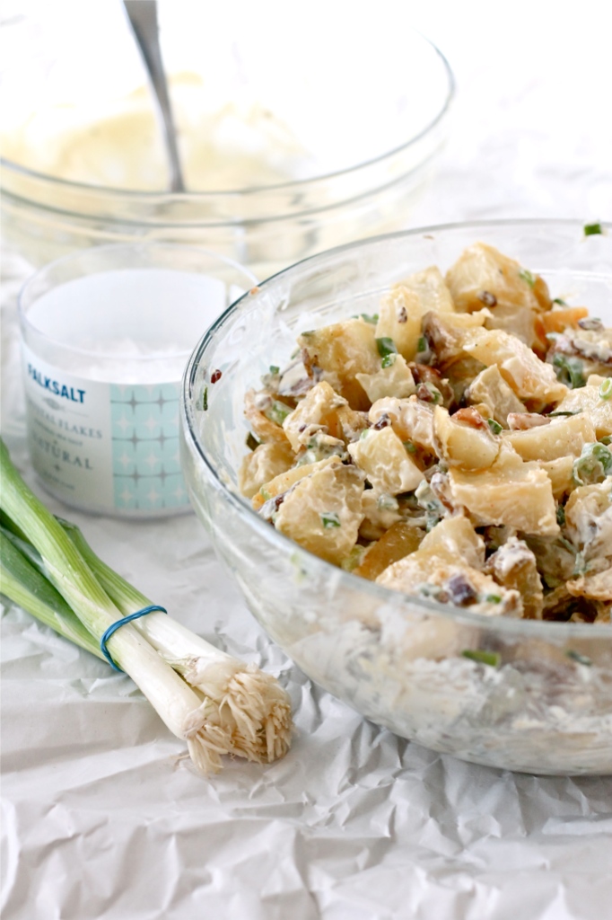 potato salad with pork belly and green onions